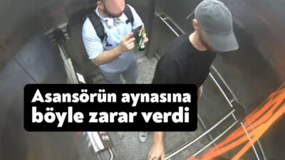 Körfez Yarımca Üst Geçidi'nde inşa edilen asansöre binen kişi, sprey