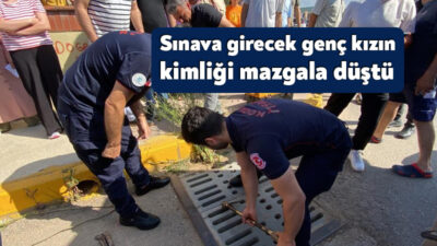 Kocaeli'nin Kartepe ilçesinde sınava girecek bir öğrenci, kimliğini okulun çevresinde