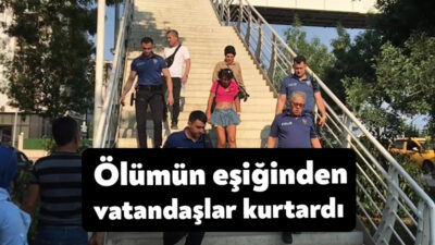Kocaeli'nin İzmit ilçesinde üst geçide çıkarak intihara kalkışan kadını vatandaşlar