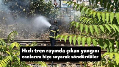 Kocaeli'nin İzmit ilçesinde hızlı tren raylarındaki otluk alanda çıkan yangını