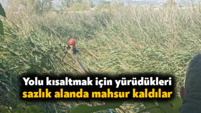 Kocaeli'nin İzmit ilçesinde yolu kısaltmak için yürüdükleri sazlık alanda mahsur