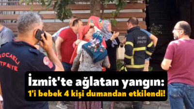 Kocaeli'nin İzmit ilçesinde bir evde çıkan yangın üst daireye de