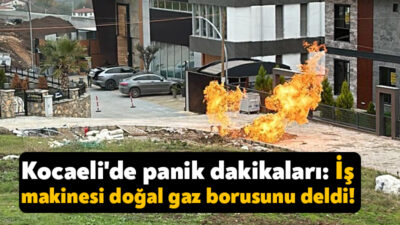 Kocaeli'nin Başiskele ilçesinde elektrik direği dikimi sırasında iş makinesi doğal