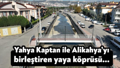 Kocaeli'de Akarca Deresi'nin karşısına geçmek için metrelerce yol yürüyen vatandaşlar,