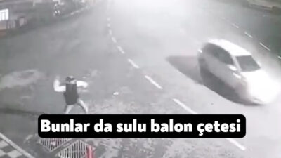 Kocaeli'nin Dilovası ilçesinde yoldan geçen araçlara içi su dolu balon