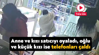 Kocaeli'nin İzmit ilçesinde bir iş yerine giren aile, satıcının dikkatini