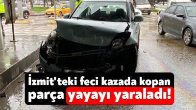 Kocaeli'nin İzmit ilçesinde çarpışan araçlardan kopan parça yoldan geçen yayanın
