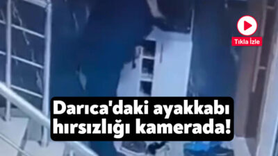 Kocaeli'nin Darıca ilçesinde bir apartmana giren hırsız, kapı önlerindeki ayakkabıları
