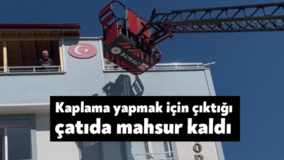 Kocaeli'nin Derince ilçesinde kaplama yapmak için çıktığı çatıda mahsur kalan