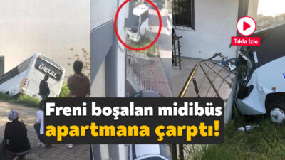 Kocaeli'nin Çayırova ilçesinde el freni boşalan park halindeki midibüs, apartman