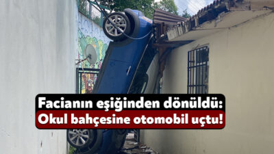Kocaeli'de kontrolden çıkan otomobil, 5 metrelik istinat duvarını aşarak okul