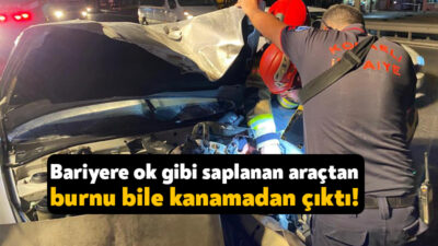 Kocaeli D100 Karayolu'nda meydana gelen kazada otomobil, yol ayrımında bariyerlere