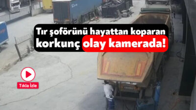 Kocaeli'nin Gebze ilçesinde, tamir edilen damperli tırının başında bekleyen şoförün,