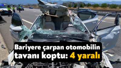 TEM Otoyolu'nun Kocaeli geçişinde bariyere çarpan otomobilin tavanı koptu. Kazada