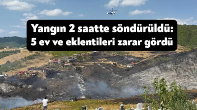 Kocaeli'nin Derince ilçesinde ağaçlık alanda çıkan yangın, yaklaşık 2 saatlik