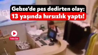 Kocaeli'nin Gebze ilçesinde giyim mağazasına giren çocuk, kasaya yönelip çekmeceleri