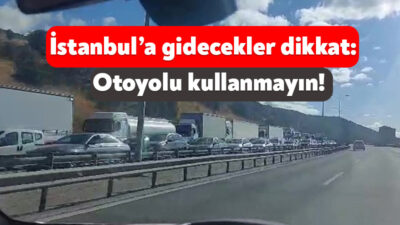 Kocaeli TEM Otoyolu'nda mıcır yüklü tırın devrilmesiyle İstanbul istikameti trafiğe