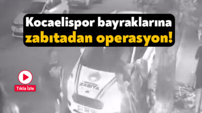 Kocaelispor'u desteklemek için esnafın astığı bayraklar Derince Belediyesi ekiplerinin gece