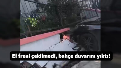 Kocaeli'nin Dilovası ilçesinde freni çekilmeden park edilen otomobil, bir evin