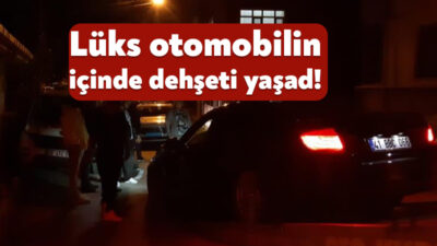 Kocaeli'nin Körfez ilçesinde bir kişi, lüks otomobilinin içerisindeyken yanına gelen