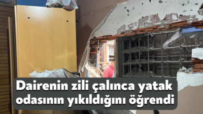 Kocaeli'de 5 katlı bir apartmanın yanındaki inşaat çalışması, 1'inci katındaki