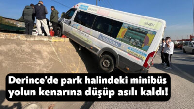 Kocaeli'nin Derince ilçesinde oto yıkamacıda park halindeyken hareket eden minibüs,