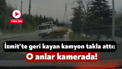 Kocaeli'nin İzmit ilçesinde geri kayarak takla atan ve refüjdeki 3