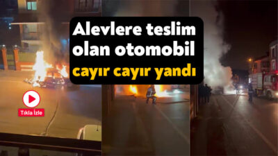 Kocaeli'nin Derince ilçesinde gece saatlerinde park halindeyken dumanlar yükselen otomobil,