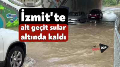 Kocaeli'nin İzmit ilçesinde sağanak nedeniyle suyla dolan alt geçitte araç