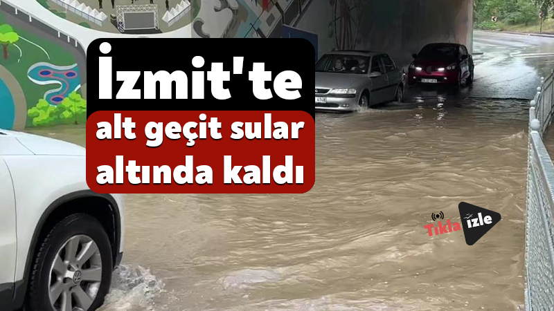 İzmit’te alt geçit sular altında kaldı Kocaeli'nin İzmit ilçesinde sağanak nedeniyle suyla dolan alt geçitte araç