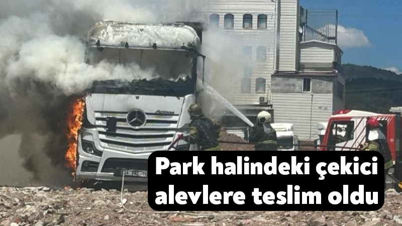 Kocaeli'nin Körfez ilçesinde tır parkında park halinde bulunan çekici, alevlere
