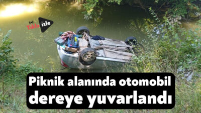 Kocaeli'nin İzmit ilçesinde kontrolden çıkan otomobil dereye yuvarlandı. Ters dönen