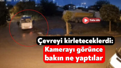 Kocaeli'nin Körfez ilçesinde boş araziye kamyonetle atık bırakmak isteyen şahıslar,